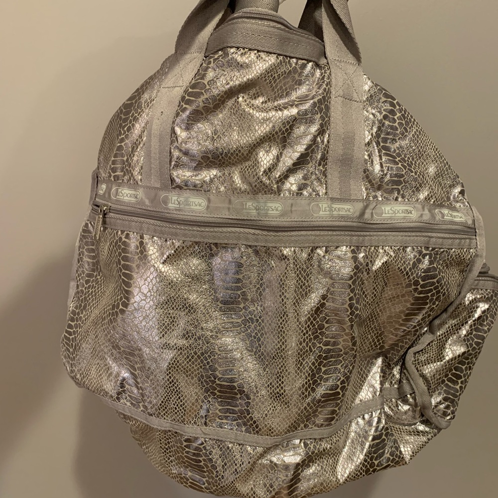 Lavender/silver metallic Kipling duffel